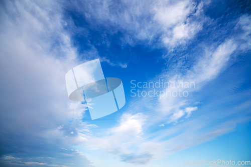 Image of Blue sky with dramatic white clouds