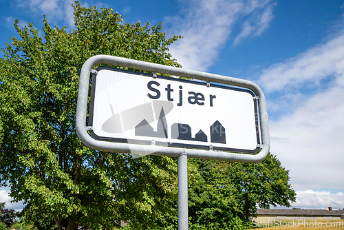 Image of Stjaer city sign in a rural countryside location