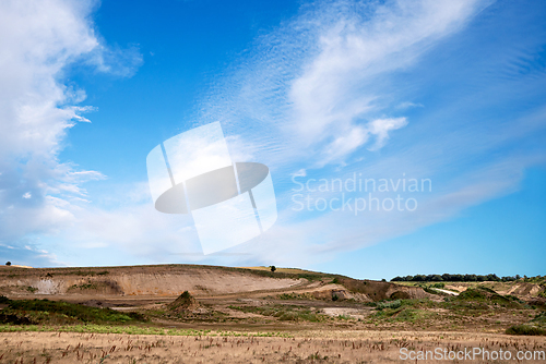 Image of Gravel pit in a rural landscape with dry flora