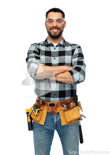 Image of happy male worker or builder with crossed arms
