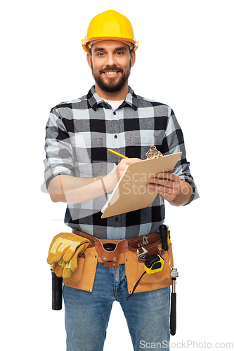 Image of male worker or builder in helmet with clipboard