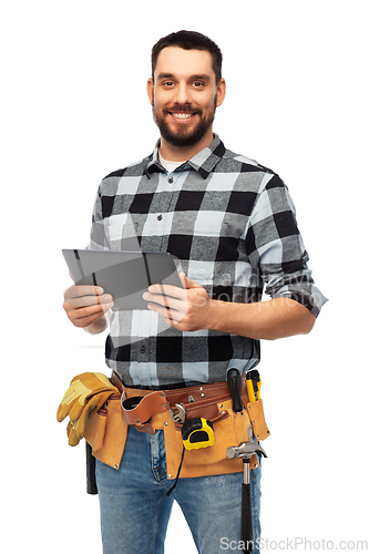 Image of happy builder with tablet computer and tools