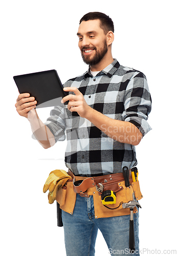 Image of happy builder with tablet computer and tools