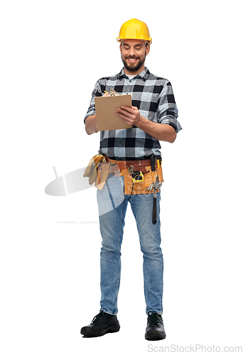 Image of male worker or builder in helmet with clipboard