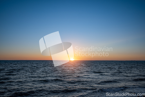 Image of Sunset over the ocean