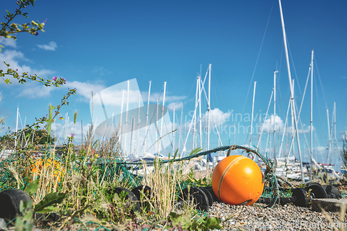 Image of Orange buoye on land
