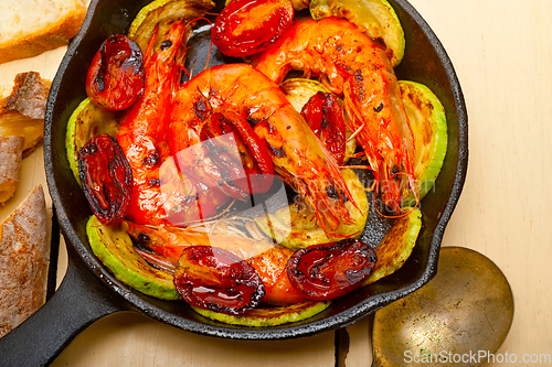 Image of roasted shrimps with zucchini and tomatoes