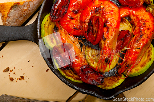 Image of roasted shrimps with zucchini and tomatoes