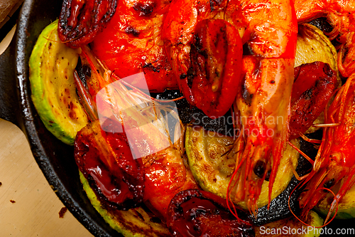 Image of roasted shrimps with zucchini and tomatoes