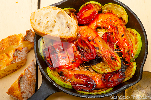 Image of roasted shrimps with zucchini and tomatoes