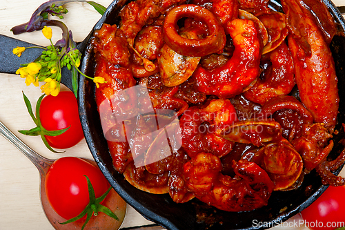 Image of fresh seafoos stew on an iron skillet