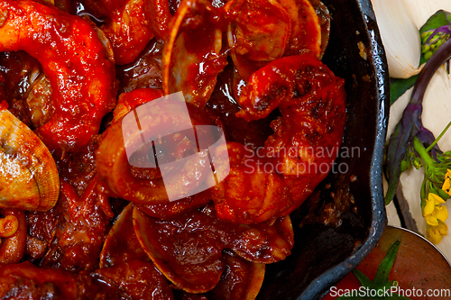 Image of fresh seafoos stew on an iron skillet