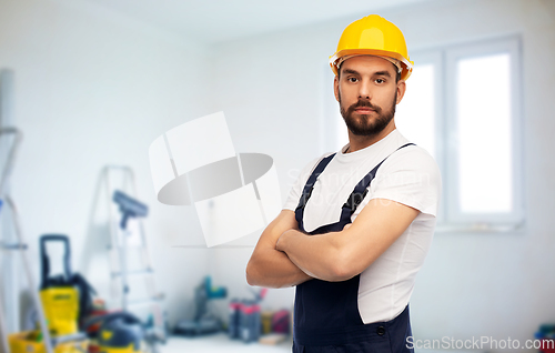 Image of male worker or builder with crossed arms