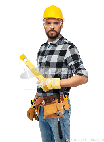 Image of male worker or builder in helmet with level