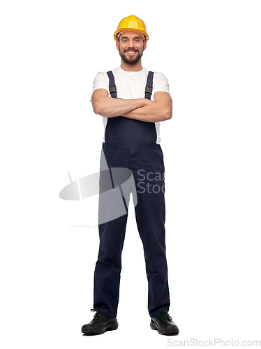 Image of male worker or builder with crossed arms