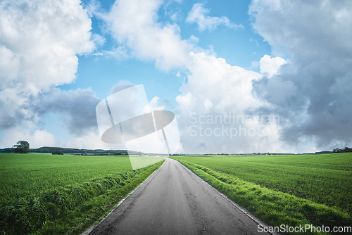 Image of Asphalt road in a rural countryside landscape