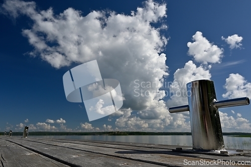 Image of metal knight on the wooden berth  