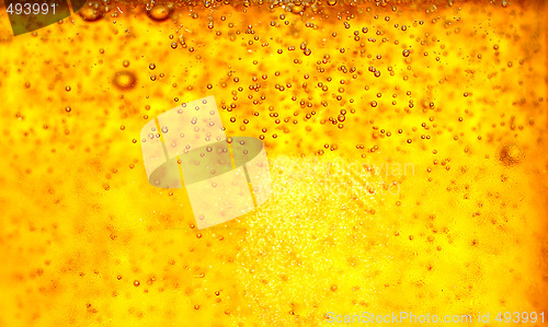 Image of Glass of beer close-up with bubbles