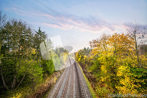 Image of Colorful autumn scenery with a railroad track