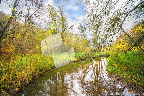 Image of Autumn scenery with a quiet river