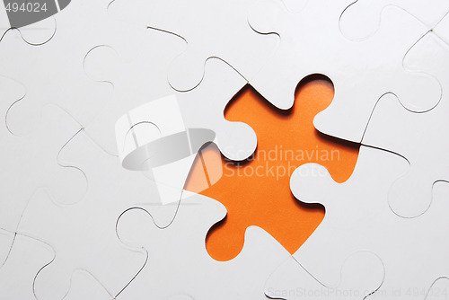 Image of puzzle background with one missing piece