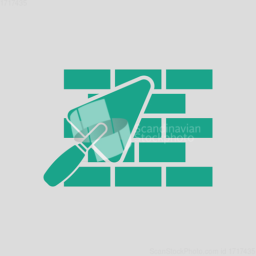 Image of Icon of brick wall with trowel