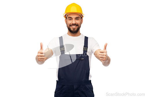 Image of male worker or builder showing thumbs up