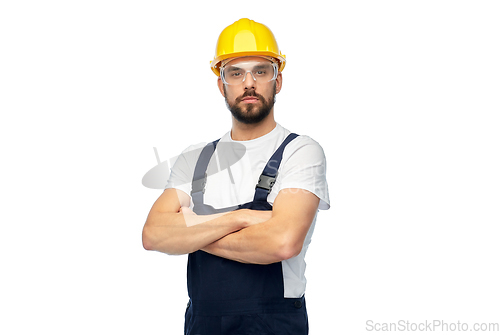 Image of male worker or builder with crossed arms