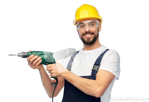 Image of happy male worker or builder in helmet with drill