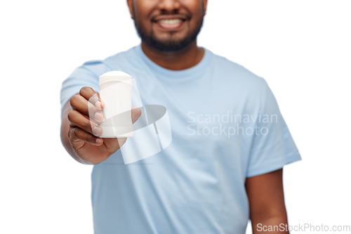 Image of african american man with antiperspirant deodorant