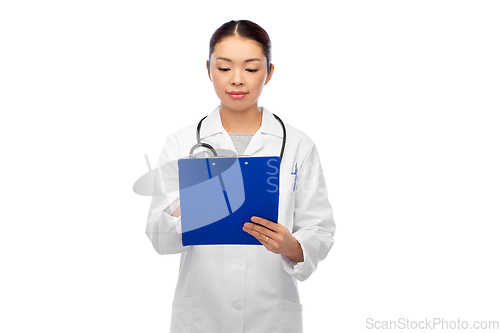 Image of asian female doctor with clipboard