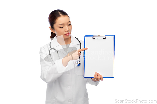 Image of asian female doctor with clipboard
