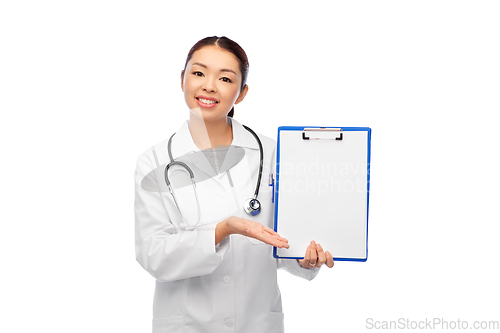 Image of happy smiling asian female doctor with clipboard