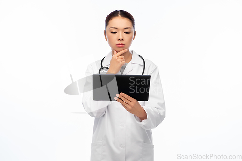 Image of asian female doctor with tablet pc and stethoscope