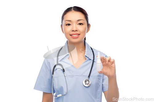 Image of smiling asian female doctor or nurse with medicine