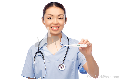 Image of asian female doctor or nurse with thermometer