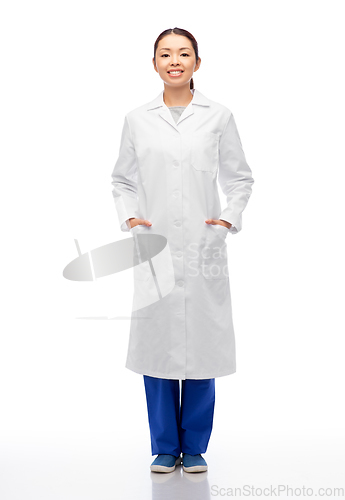 Image of happy smiling asian female doctor in white coat