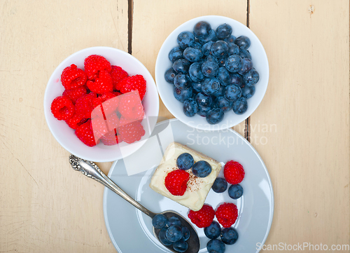 Image of fresh raspberry and blueberry cake