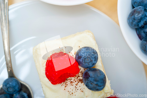 Image of fresh raspberry and blueberry cake