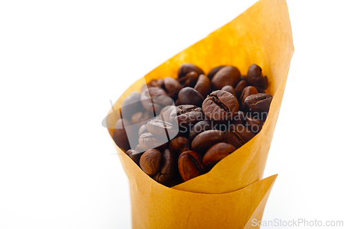 Image of espresso coffee beans on a paper cone