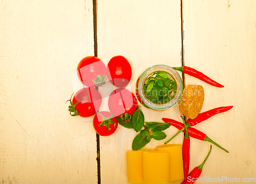 Image of Italian pasta paccheri with tomato mint and chili pepper