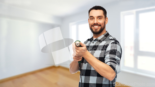 Image of happy man, worker or builder with drill