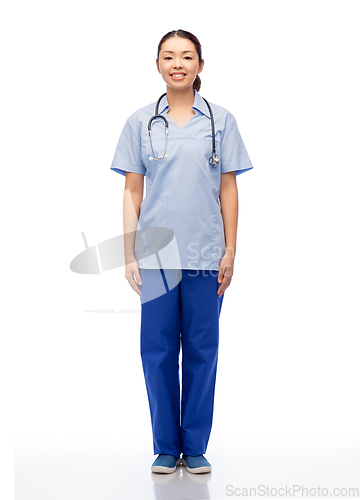 Image of smiling asian female doctor or nurse in uniform