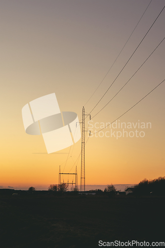 Image of Electrical pylons at dawn