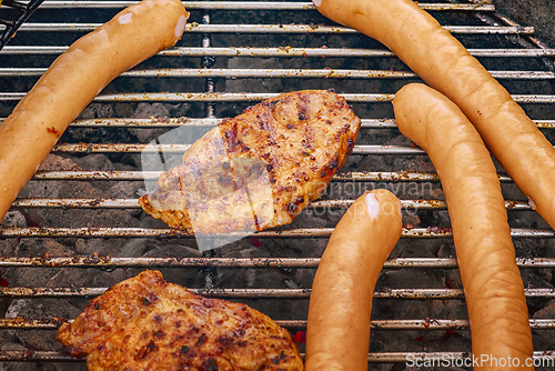 Image of Barbeque sausages and pork chops