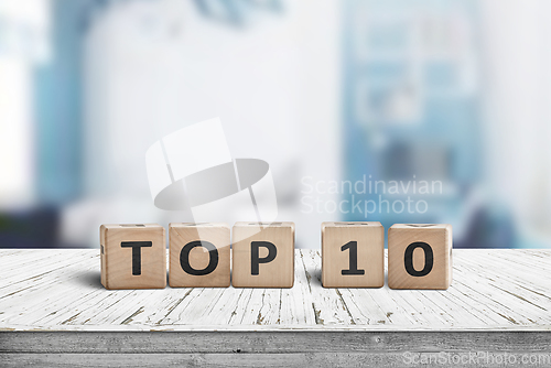 Image of Top 10 sign made of wooden dices