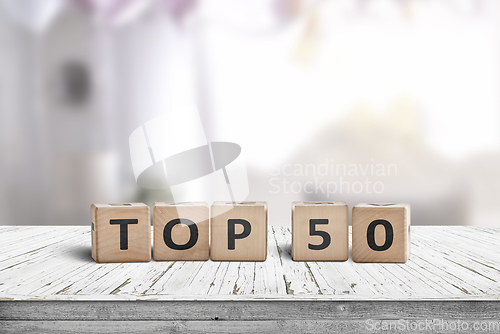 Image of Top 50 sign made of wooden cubes