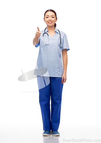 Image of smiling asian female doctor or nurse in uniform