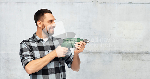 Image of happy man, worker or builder with drill