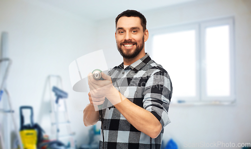 Image of happy man, worker or builder with drill